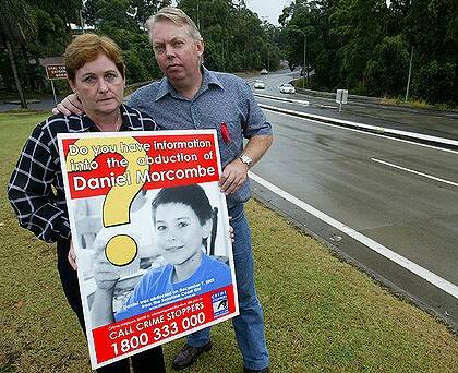 Bruce and Denise Morcombe with a poster about their son Daniel's disappearance. Photo: Jon Reid