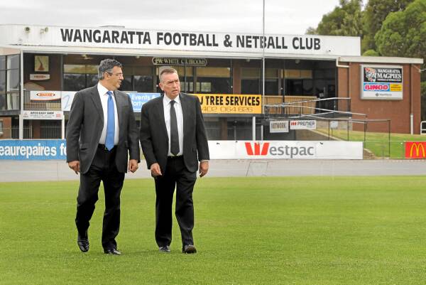 Andrew Demetriou takes a close look at Norm Minns Oval with Wangaratta council chief Doug Sharp yesterday. Picture: TARA GOONAN