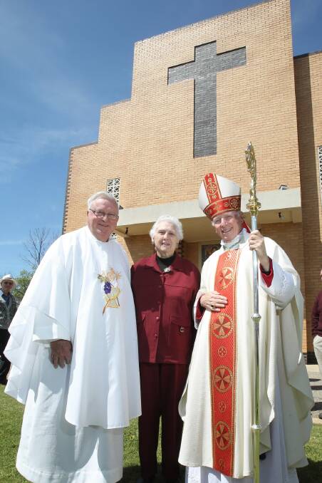 Father John Ware, Mary McLinden and Bishop Leslie Tomlinson celebrate 50 years of St Mary’s Catholic Church in Rutherglen. Picture: MARK JESSER