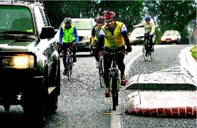 Cyclists show the little road space.