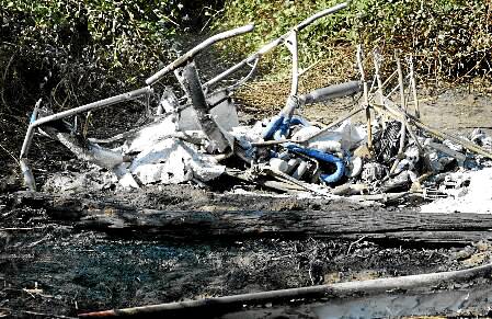The remains of Andrew Mull’s helicopter after the March, 2006, crash.