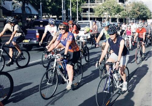 Riders head along Dean Street in support of Kris Mandeville yesterday.