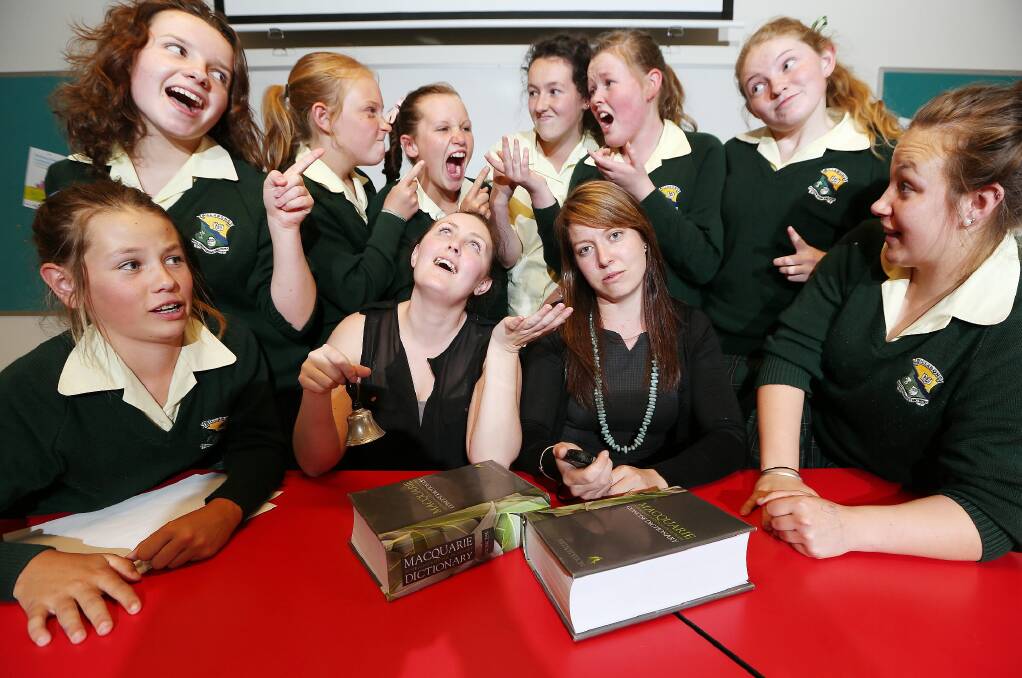 Melanie Wright, 13, Emily Jones, 14, Claire Holt, 13, Alyce Parker, 13, Samantha Wilkinson, 14, Annie Pumpa, 15, Victoria Leov, 15, and Sarah Bahr, 15, with teachers Aimee Baldock and Jessica Albey (centre) who were part of both the winning and second-place teams. Picture: John Russell