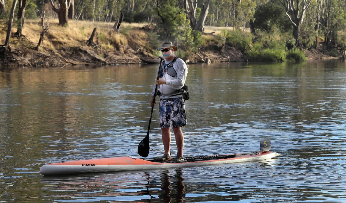 Bill Robinson of Mt Eliza is competing in his 24th marathon. He built his own canoe which has crossed the Bass Strait. BiKiaran Lowmas of Queensland who is trying to do the entire journey standing up.Pictures: PETER MERKESTEYN 