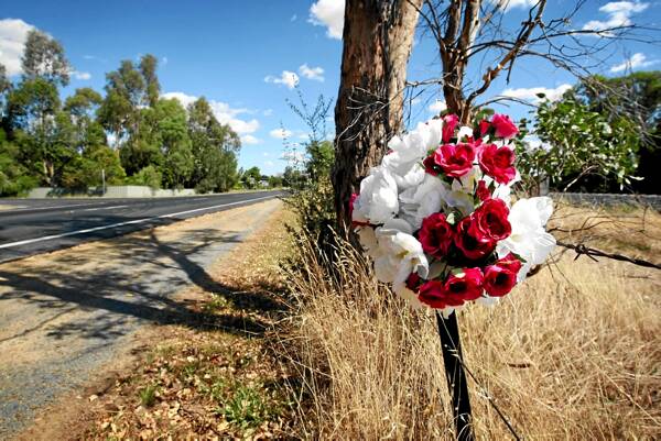 Flowers at the scene where Daniel Hansen was struck and killed by a car early Saturday. Picture: MATTHEW SMITHWICK