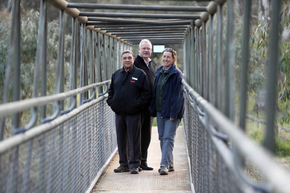 A grant for a boardwalk and bike trail upgrade has been given to Mungabareena Aboriginal Corporation. Matt Burke, Jon Retford and Ant Packer have worked in partnership on the project. Picture: PETER MERKESTEYN
