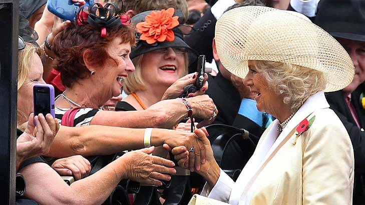 Camilla, Duchess of Cornwall is greeted by racegoers at Flemington.