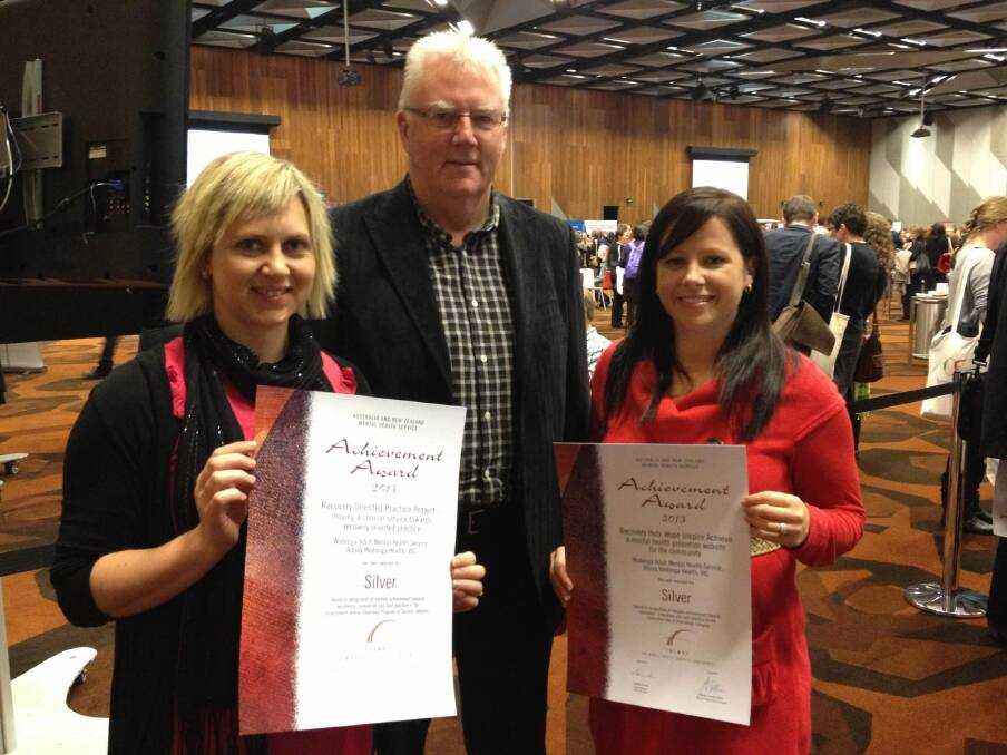 Project officer Alison Delphin, program manager Greg Calder and occupational therapist Dannielle McLeish were delighted with the awards they accepted at the Melbourne Convention Centre. Picture: DI THOMAS