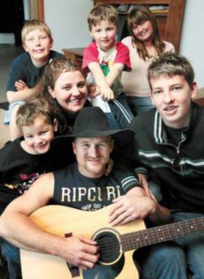 Korey Livy with his family Kade, 7, Connor, 12, wife Nicole, Nask, 5, Jaycee, 13, and Dalan, 15. Absent is Brendan, 10. Picture: PETER MERKESTEYN