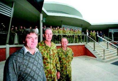 Ross Borella, Major General Ash Power and Colonel Michael Batiste inspect the new club yesterday. Picture: MATTHEW SMITHWICK