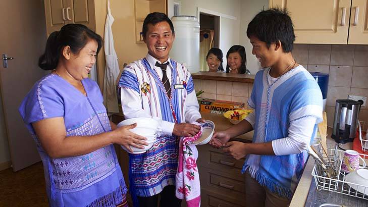 New opportunities … Burmese refugee Gay Htoo Paw, centre, moved his family from Sydney to Albany in search of work.