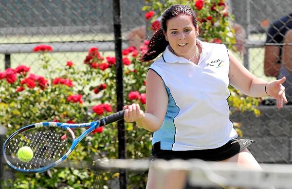 Maddi Gregor in action for Albury in the under-19 tennis tournament.