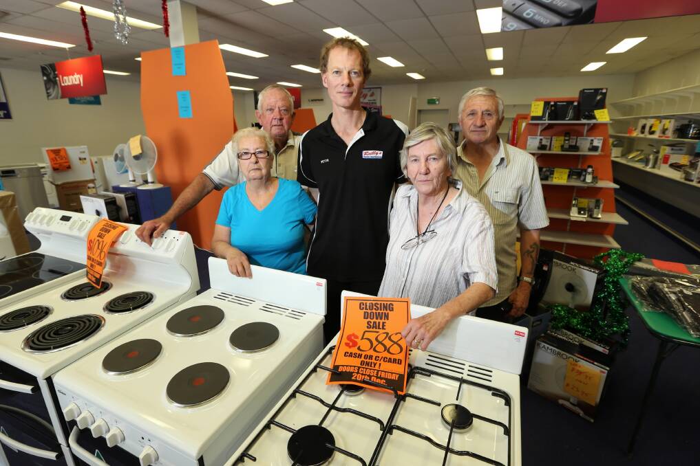 Reilly’s Home Appliances store manager Peter Mitchell, with customers Kris Brown, Peter Mears, Jan Mears, and Les Brown who had come to say their goodbyes at the closing Corowa shop. Picture: MATTHEW Smithwick