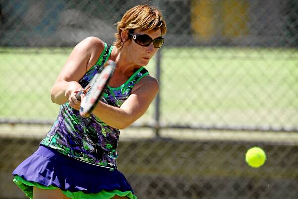 Alison Tinworth uses the double-handed backhand.