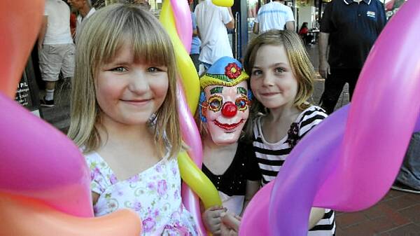 Alanah Shepherd, 6, Jasmine Shepherd, 4, and Jessica Cadman-Reedy, 7, show off their balloons.