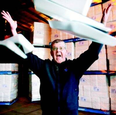 l Garry Clancey celebrates the sale of Thurgoona’s food packaging plant to the Pact Group. Picture: RAY HUNT