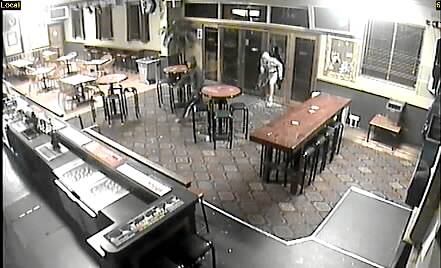 Security footage shows the two intruders during their break-in at The Carriers Hotel on Wednesday night.