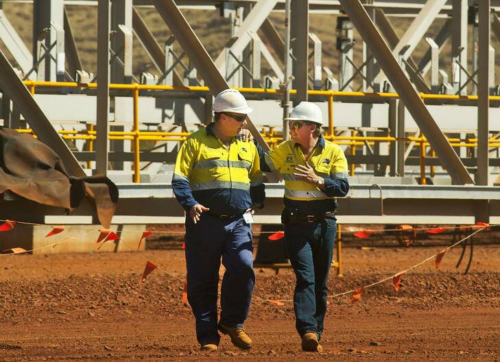 Fortescue Solomon manager Blake Cannavo talks with the company's founder Andrew Forrest.