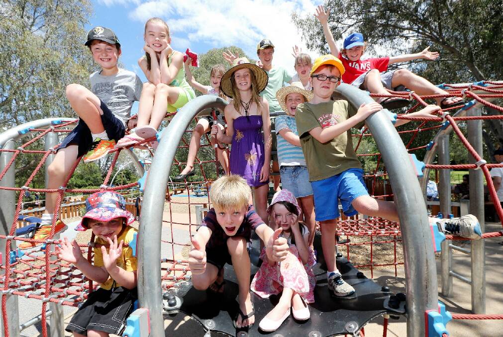 Ben Tyrrell, 7, Karsa Collins, 10, Olivia Tyrrell, 9, Lilly Griggs, 13, Max Griggs, 15, Phoebe Griggs, 9, Abbey Tyrrell, 7, Harry Griggs, 7, Tom Griggs, 11, with Will Tyrrell, 4, Tayg Collins, 8, and Sophie Tyrrell, 6, get together at Oddies Creek playground yesterday.Pictures: JOHN RUSSELL