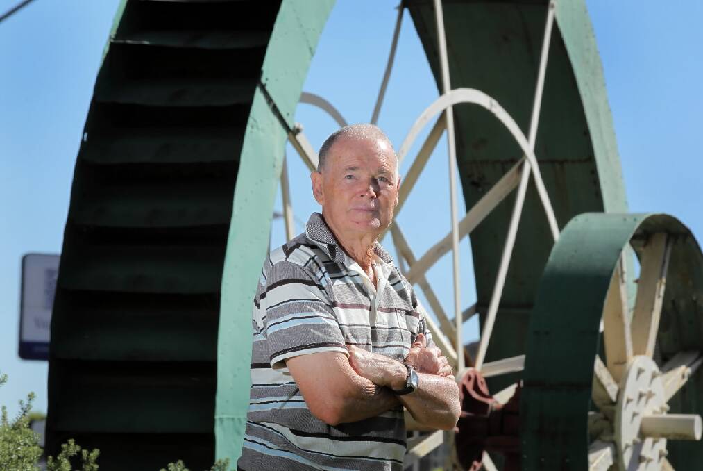 Alan Beer with the water wheel his family donated to Albury. Picture: DAVID THORPE.