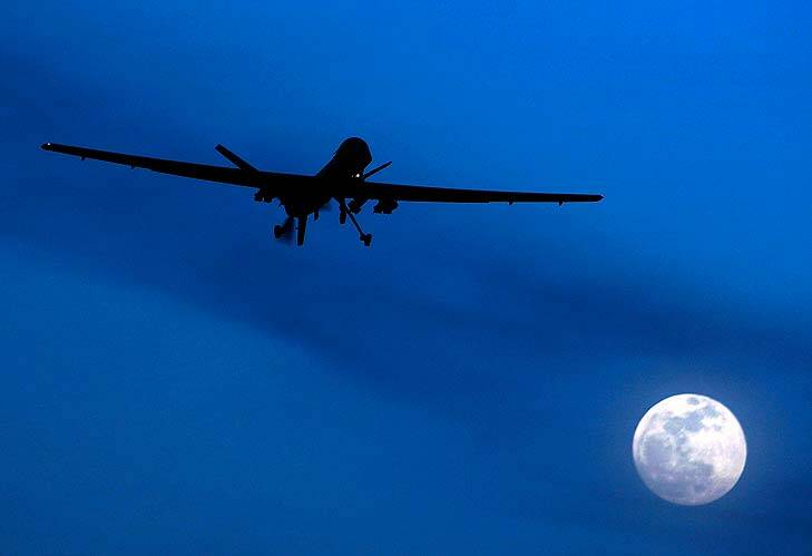 An unmanned Predator drone flies over Kandahar Air Field in Afghanistan.