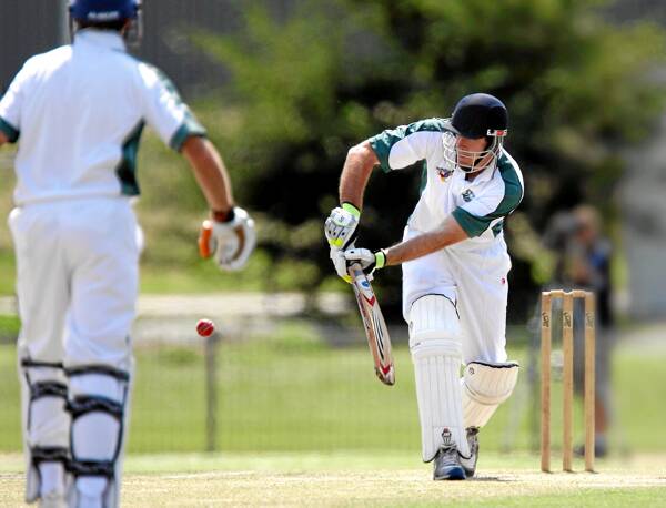 St Patrick’s batsman Grant Ellis drives down the wicket. Pictures: RAY HUNT