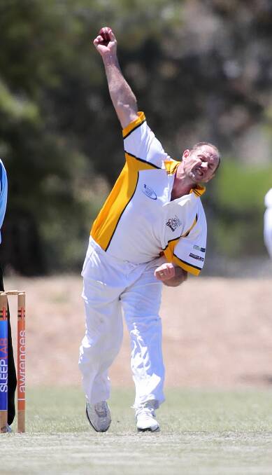 Tallangatta’s Steve Wood rifles down a delivery before succumbing to a calf injury. Picture: JOHN RUSSELL