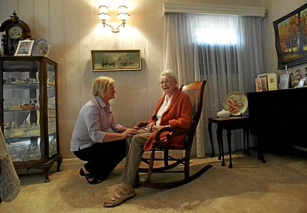 Marjory Chamberlain at home with aged-care worker Dianne Bradley. Picture: FAIRFAX