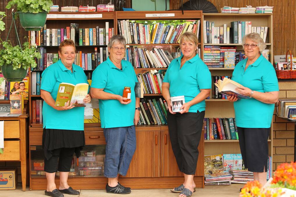 Marg Pallot, Karen Ferguson, Heather Watts, and Kay Pollard have found a thriving market for books and preserves as they raise money for the Border Ovarian Cancer Group. Picture: MATTHEW SMITHWICK