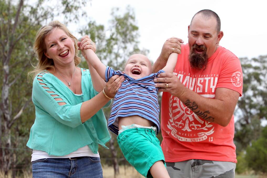  For parents Melissa and Darren, of Balldale, nothing pleases them more than seeing Jack laughing and smiling. Pictures: MARK JESSER; SUPPLIED