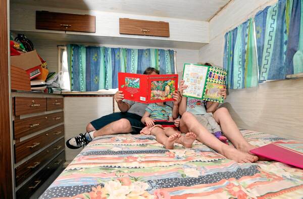 Kristy and John have been living in a caravan with their two young daughters. Picture: KYLIE ESLER
