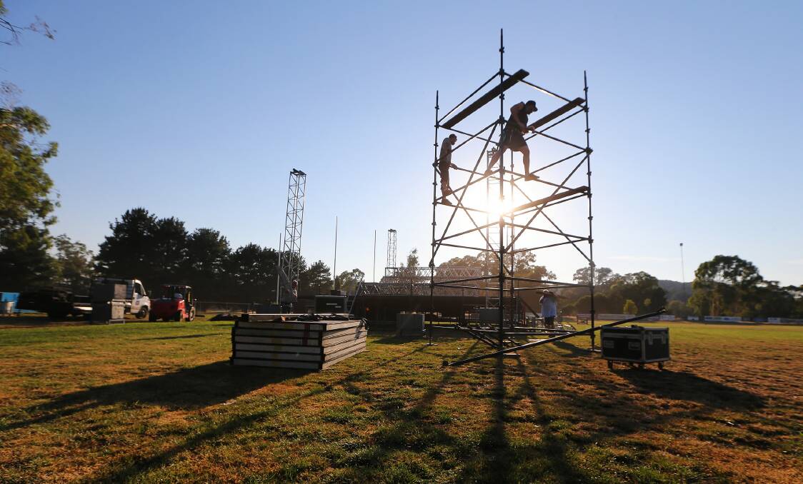 RIGHT: Workers start to erect the stage ahead of tomorrow’s Opera in the Alps at Baarmutha Park in Beechworth. Picture: JOHN RUSSELL
