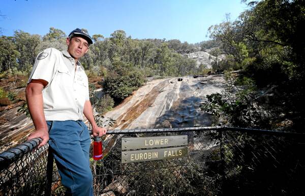 Mount Buffalo ranger Julien Atherstone says warning signs at Eurobin Falls will be reviewed after three people were injured. Picture: JOHN RUSSELL