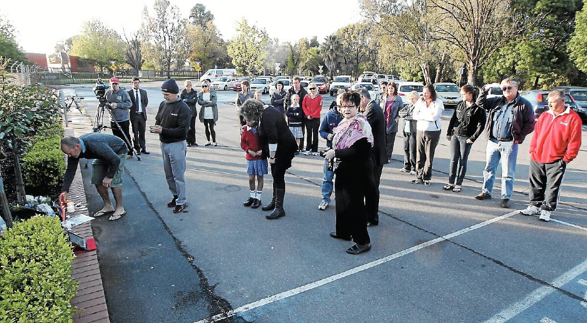 A minute’s silence was held for Ms Hore outside the Albury Swim Centre.
