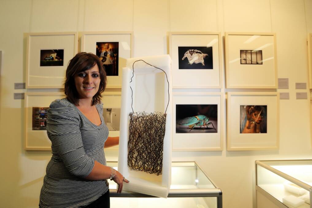 Albury visual arts co-ordinator Bianca Acimovic hope the new exhibition of images at the Lavington Library will be more interesting than pristine and polished artefacts. Picture: MATTHEW SMITHWICK