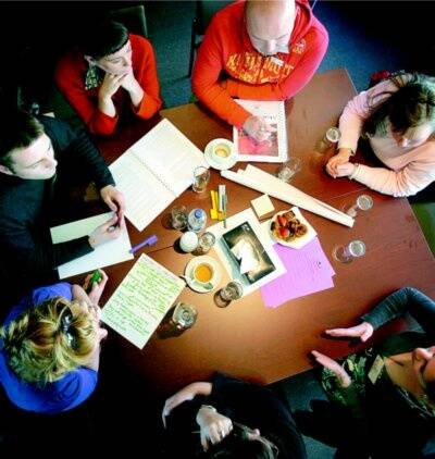 A brainstorming session takes place over the study of teen pregnancy. Picture: JOHN RUSSELL