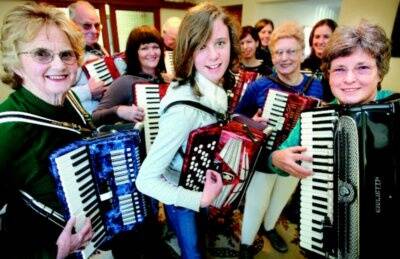 l Piano accordionists Judith Whitehead, Kate Morell, 13, and Heather Wilson are among those who will take part in an attempt to break a world record for accordion players. Picture: JOHN RUSSELL