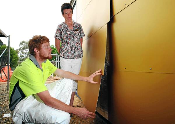 Matt Gilchrist and Sharon Mawby inspect damage caused by vandals. Picture: MATTHEW Smithwick