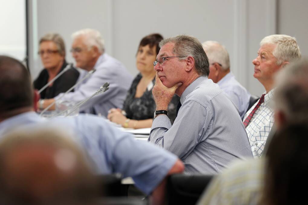 Cr John McInerney listens intently to arguments for and against the Caltex plan. Pictures: JOHN RUSSELL