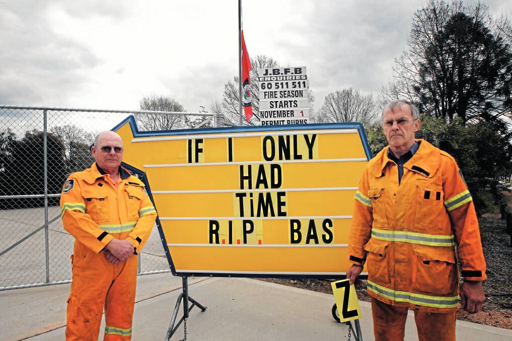 ABOVE: Denise Osborne with her husband Barry following her election to the newly formed Greater Hume Council in March, 2005.
LEFT: Jindera fire brigade president Ray Rose and captain Graham Yensch with one of Mr Osborne’s favourite sayings replete with spelling errors. Picture: PETER MERKESTEYN