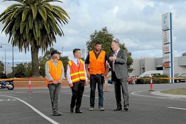 Wodonga Council design engineer John Luftensteiner, acting manager of infrastructure and works Theo Panagopoulos, operations manager at Walsh Earthmoving Nicholas McNamara and mayor Mark Byatt. Picture: TARA GOONAN