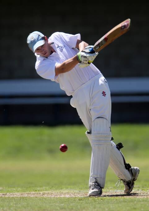 City Colts batsman Nick Norris blasts into the on-side during his innings of 16. 