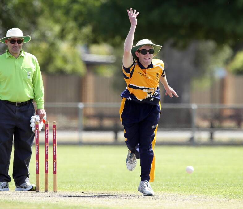 ACT representative, Albury’s Daniel Searle, bowls underarm in the match against New City. Pictures: MATTHEW SMITHWICK 