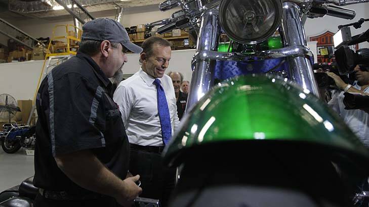 Opposition Leader Tony Abbott visits a Harley Davidson store in Fyshwick, Canberra.