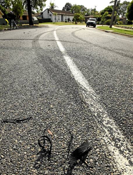 Black tyre marks show the path of the hoon driver. 