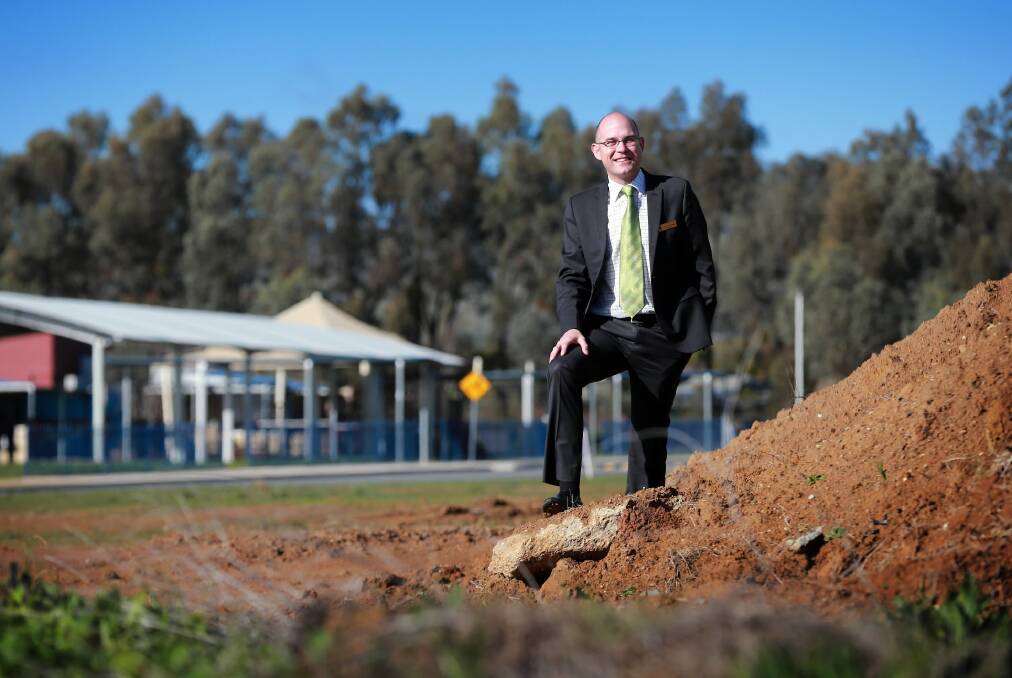 Victory Lutheran College principal Cain McDonald stands on the site where a technical trades centre is planned to be built. Picture: JOHN RUSSELL