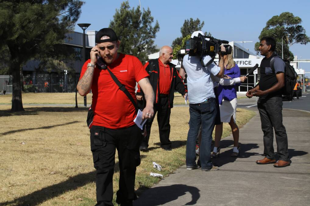 Toyota workers leave the factory after being told their jobs will be lost in 2017. Picture: FAIRFAX