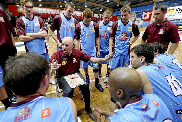 Coach Brad Chalmers tries to find some answers during a time-out. Picture: JOHN RUSSELL