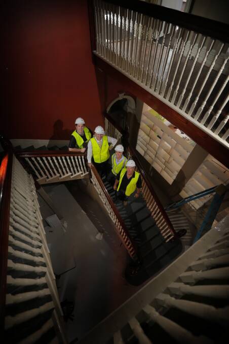 Project manager Brendan Tracey, Albury mayor Kevin Mack, construction manager Simon Peddler and site manager Andrew Dean on the staircase in the old art gallery. Pictures: TARA GOONAN