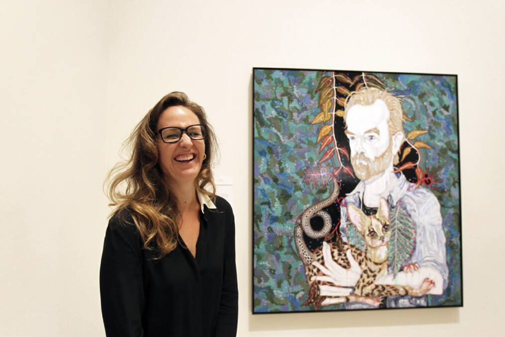 Del Kathryn Barton with her winning portrait of Hugo Weaving. Picture: FAIRFAX